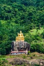 Buddha statue at a hill slope near Aluvihare Rock Temple, Sri Lan Royalty Free Stock Photo