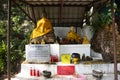 Buddha statue and holy at front of Tham Muang On cave in mountain of Mae On for thai people and foreign travelers travel visit