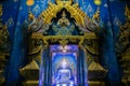 Buddha statue inside Blue Temple Wat Rong Suea Ten