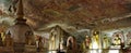 Panorama of Buddha statues inside Dambulla cave temple, Sri Lanka