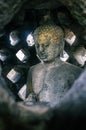 Buddha Statue inside one of the stupa structure of Borobudur Temple, Magelang, Central Java, Indonesia, 25 December 2019