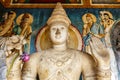 Buddha statue inside of Ruvanvelisaya Dagoba, a cetiya or stupa in the sacred city of Anuradhapura, Sri Lanka