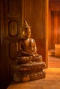 Buddha statue made of wood Located in the temple. Wood carving Royalty Free Stock Photo