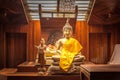 Buddha statue made of wood Located in the temple. Wood carving Royalty Free Stock Photo