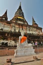 Buddha statue and main chedi. Wat Yai Chai Mongkhon temple. Ayutthaya. Thailand Royalty Free Stock Photo