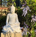 Buddha Statue Meditation in the Garden Peaceful Meditating Sculpture Royalty Free Stock Photo