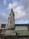 buddha statue in the middle of big city