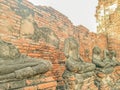 Buddha statue no head Wat Chaiwatthanaram temple in Ayuthaya Historical Park, a UNESCO world heritage site in Thailand Royalty Free Stock Photo