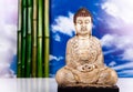 Buddha statue with orchid flower Royalty Free Stock Photo