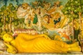 Buddha statue and painting in Buddhist temple Wewurukannala Vihara near Dikwella - Sri Lanka