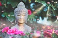Buddha statue with petals falling