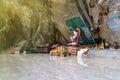 Buddha statue in a rock in the ancient forest Royalty Free Stock Photo