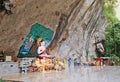 Buddha statue in a rock in the ancient forest Royalty Free Stock Photo