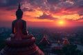 Buddha statue sitting on a building during Wesak or Vesak day