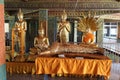 Buddha statue standing, lying, sitting in the temple.