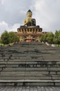 Prayer wheels with buddha statue at Tathagata Tsal Buddha Park in ravangla sikkim India