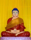 Buddha statue Wearing a red robe