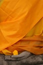 Buddha Statue Wrapped in Orange Fabric