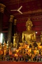 Buddha statues inside temple in Luang Prabang