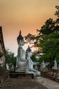 Buddha statues at sunset inside Wat Yai Chai Mongkhon, a Buddhist temple of archaeological park