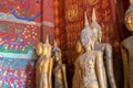Buddha statues at Wat Xieng Thong in Luang Prabang, Laos. Royalty Free Stock Photo