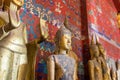 Buddha statues at Wat Xieng Thong in Luang Prabang, Laos. Royalty Free Stock Photo