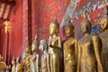 Buddha statues at Wat Xieng Thong in Luang Prabang, Laos. Royalty Free Stock Photo