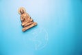 Buddha statuette on the earth Royalty Free Stock Photo