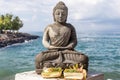 Buddha stone small statue on the east of Bali island. Royalty Free Stock Photo