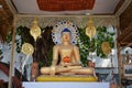 Buddha in subduing Mara posture. Royalty Free Stock Photo