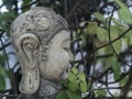 Buddha stone statue in the magic garden Royalty Free Stock Photo