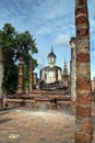 Buddha in Wat Mahathat or Mahathat Temple in Sukhothai Historical Park in Thailand. The temple`s name translates to `temple of the Royalty Free Stock Photo