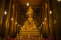 Buddha in a wihana of a Buddhist temple Wat Phra Chetuphon. Bangkok