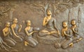 Buddha wooden carving.Mural paintings tell the story about the Buddha`s history Royalty Free Stock Photo