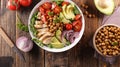 Buddhal bowl, vegetable salad with grilled chicken, avocado, tomato