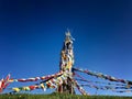 Buddhism colorful prayer flags symbol od spirtualof Tibetan on the mountain with blue sky