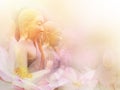 Golden monk statues sitting in a row and floral abstract pink blossom water lily with pastel vintage soft style Royalty Free Stock Photo