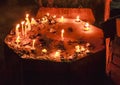 Buddhist altair with candles at Lumbini Garden, the Buddha birthplace in Lumbini, Nepal in night