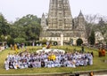 Buddhist believers in front of Mahabodhi temple