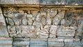 Buddhist Carved On The Wall Of Borobudur Temple In Central Java, Indonesia. Royalty Free Stock Photo