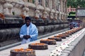 Buddhist devotee next to the Mahabodhi temple Royalty Free Stock Photo