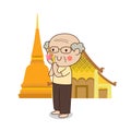 Buddhist elderly man walking with lighted candle in hand around temple