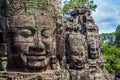 Buddhist faces on towers at Bayon Temple, Cambodia Royalty Free Stock Photo