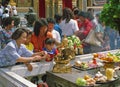 Buddhist family praying.