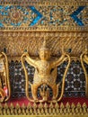 Buddhist Garuda birds, gilded decoration n the Grand Palace, Bangkok, Thailand. Royalty Free Stock Photo