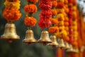 Buddhist golden bell hanging on festival background with orange marigold flowers. Ritual hand bell in Buddhist temple Royalty Free Stock Photo