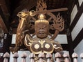 Buddhist guardian deity statue inside the gates of Nankobo, temple number 55 of Shikoku Royalty Free Stock Photo