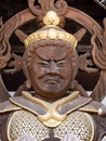 Buddhist guardian deity statue inside the gates of Nankobo, temple number 55 of Shikoku Royalty Free Stock Photo