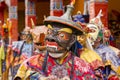 Buddhist lamas dressed in mystical mask dancing Tsam mystery dance in time of Yuru Kabgyat Buddhist festival at Lamayuru Gompa, La Royalty Free Stock Photo