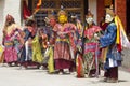 Buddhist lamas dressed in mystical mask dancing Tsam mystery dance in time of Yuru Kabgyat Buddhist festival at Lamayuru Gompa, La Royalty Free Stock Photo